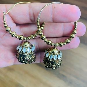 Its golden round earrings in good condition